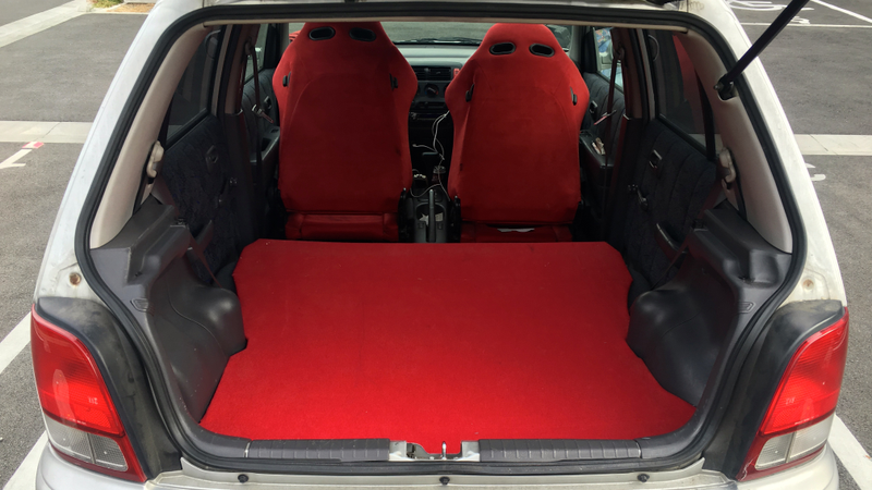 Illustration for article titled How To Turn Your Hatchback Into A Mini-Camper For Cheap Road Trips